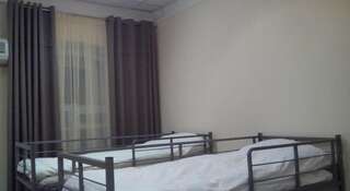 Гостиница Hostel 24х7 Вологда Кровать в общем 10-местном номере для мужчин и женщин-4